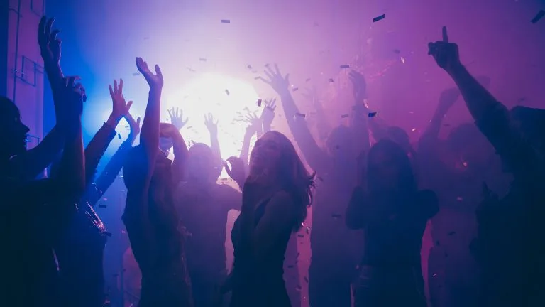 Nice attractive stylish cheerful cheery positive carefree guys ladies, having fun hanging out best summer year student festive in new cool bar modern place indoors
